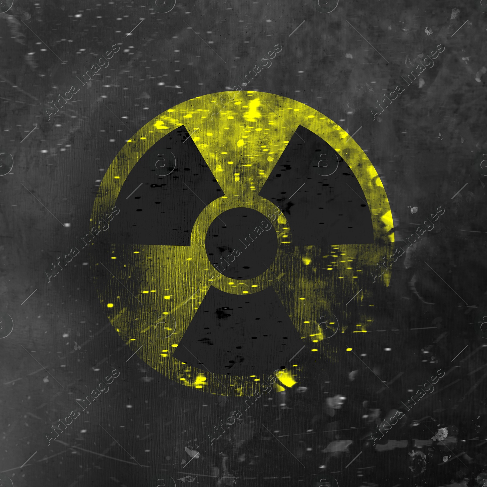 Image of Yellow radioactive sign on grey textured background. Radiological pollution