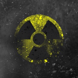 Image of Yellow radioactive sign on grey textured background. Radiological pollution
