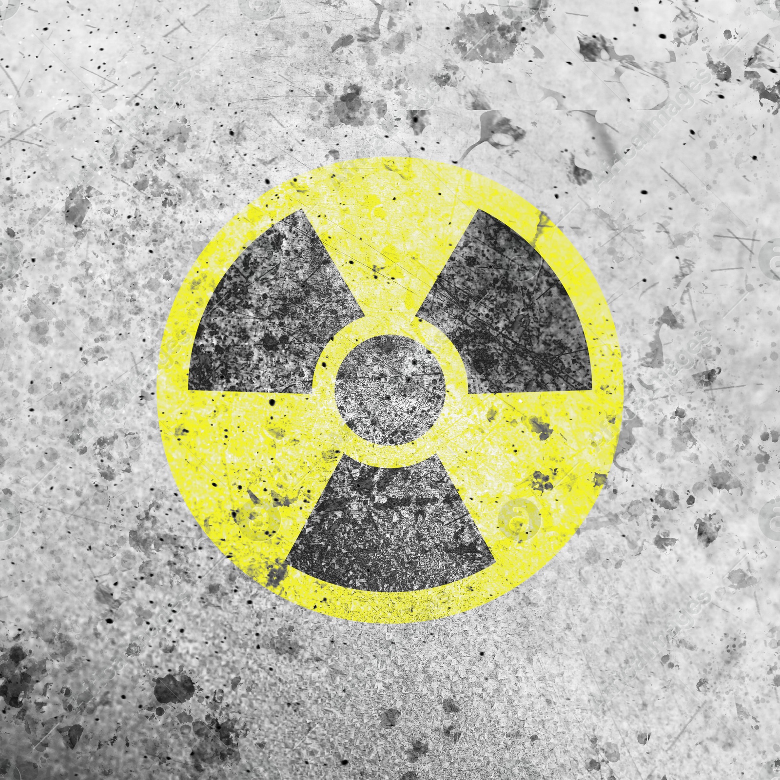 Image of Yellow radioactive sign on white textured background. Radiological pollution