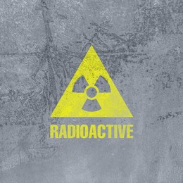 Image of Yellow radioactive sign on textured background. Radiological pollution