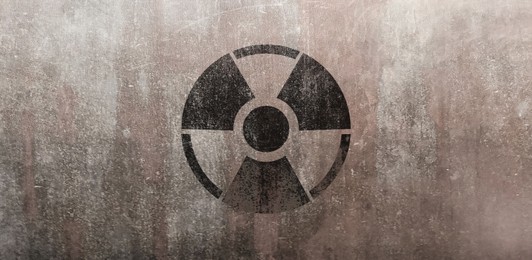 Image of Black radioactive sign on textured background, banner design. Radiological pollution