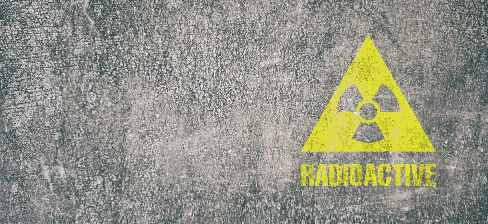 Image of Yellow radioactive sign on textured background, banner design. Radiological pollution