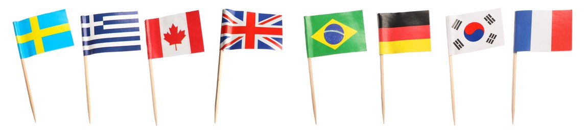 Image of Small paper flags of different countries isolated on white, set. Sweden, Greece, Canada, United Kingdom, Brazil, Germany, South Korea and France