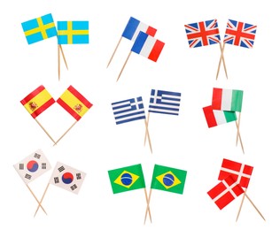 Image of Small paper flags of different countries isolated on white, set. Sweden, Greece, United Kingdom, Brazil, Spain, South Korea, Italy, Denmark and France