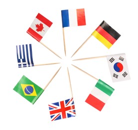 Image of Small paper flags of different countries isolated on white, set. France, Germany, South Korea, Italy, United Kingdom, Brazil, Greece and Canada