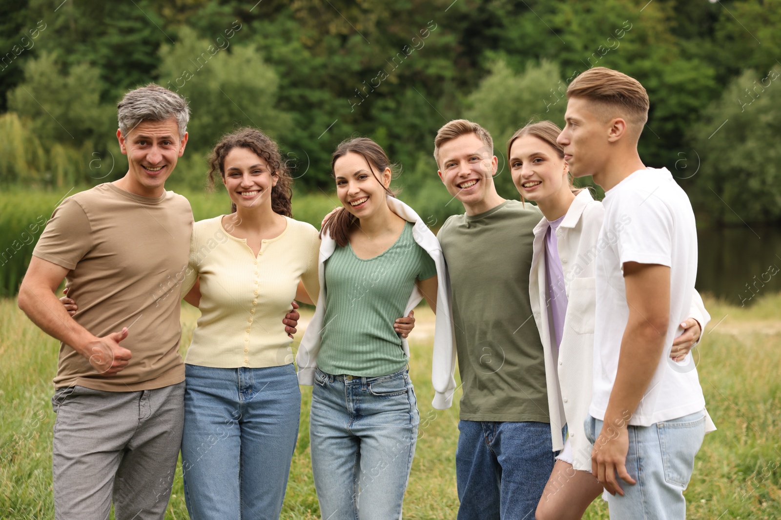 Team building. Group of happy people together outdoors Photo of Team building. Group of happy people together outdoors