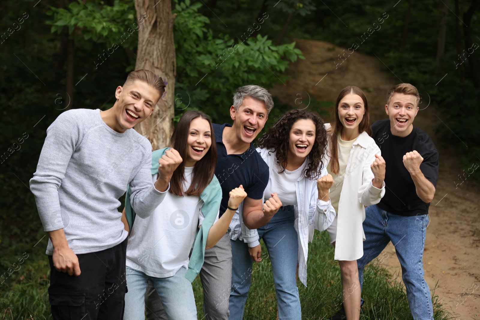 Team building. Group of happy people together outdoors Photo of Team building. Group of happy people together outdoors