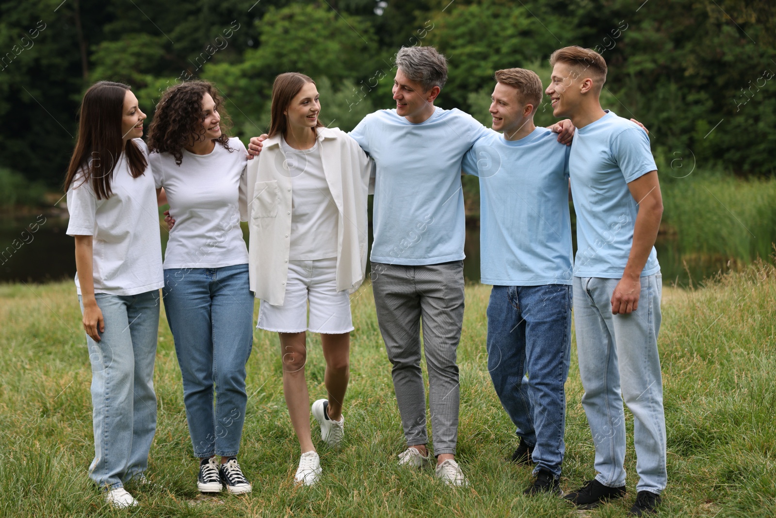 Team building. Group of happy people together outdoors Photo of Team building. Group of happy people together outdoors