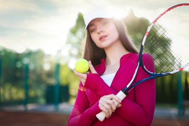 Photo of Beautiful woman with racket and ball at tennis court