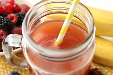 Photo of Superfood. Healthy drink in mason jar and ingredients on table, closeup
