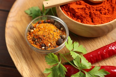 Photo of Different aromatic spices on table, closeup view