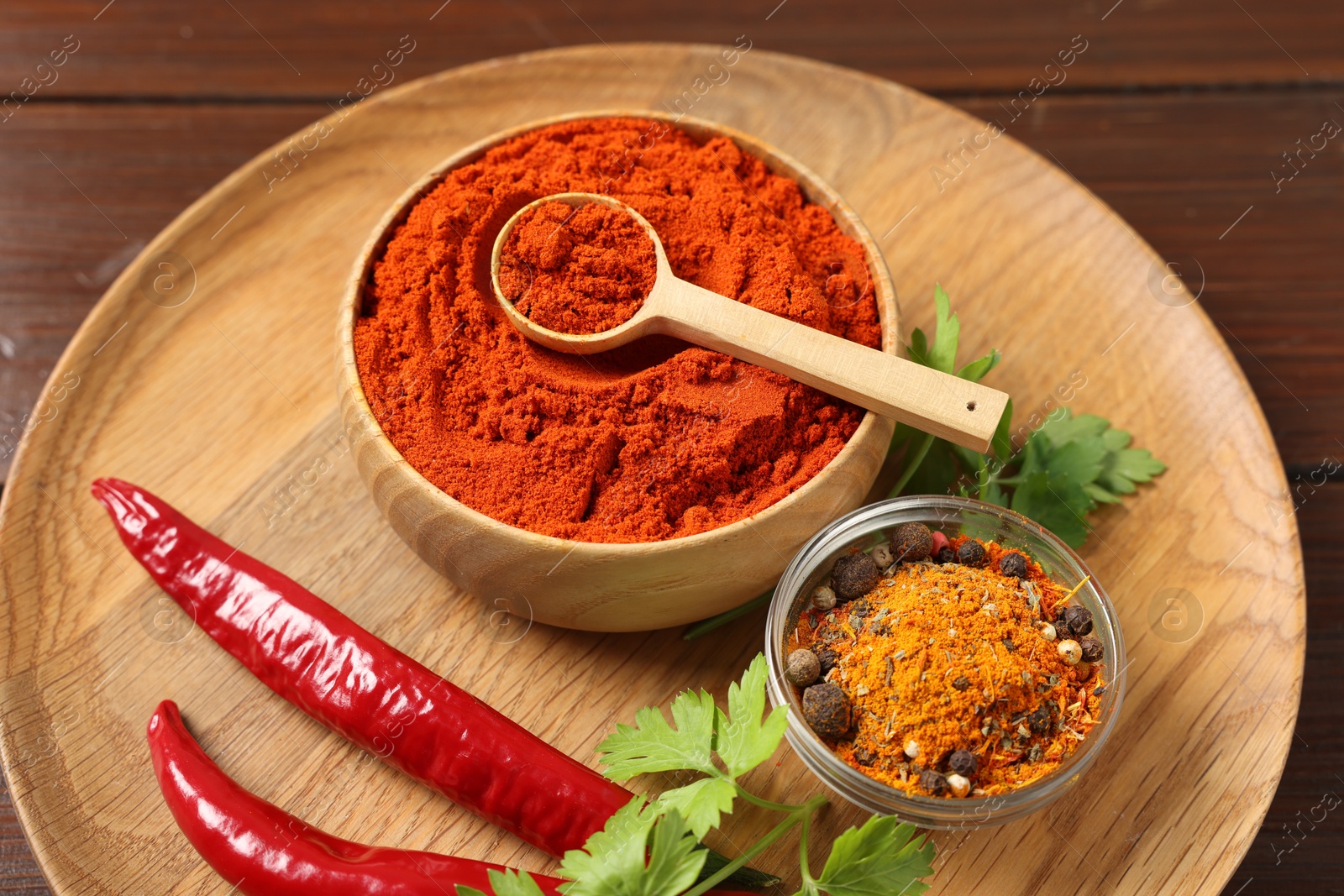 Different aromatic spices on wooden table, closeup Photo of Different aromatic spices on wooden table, closeup