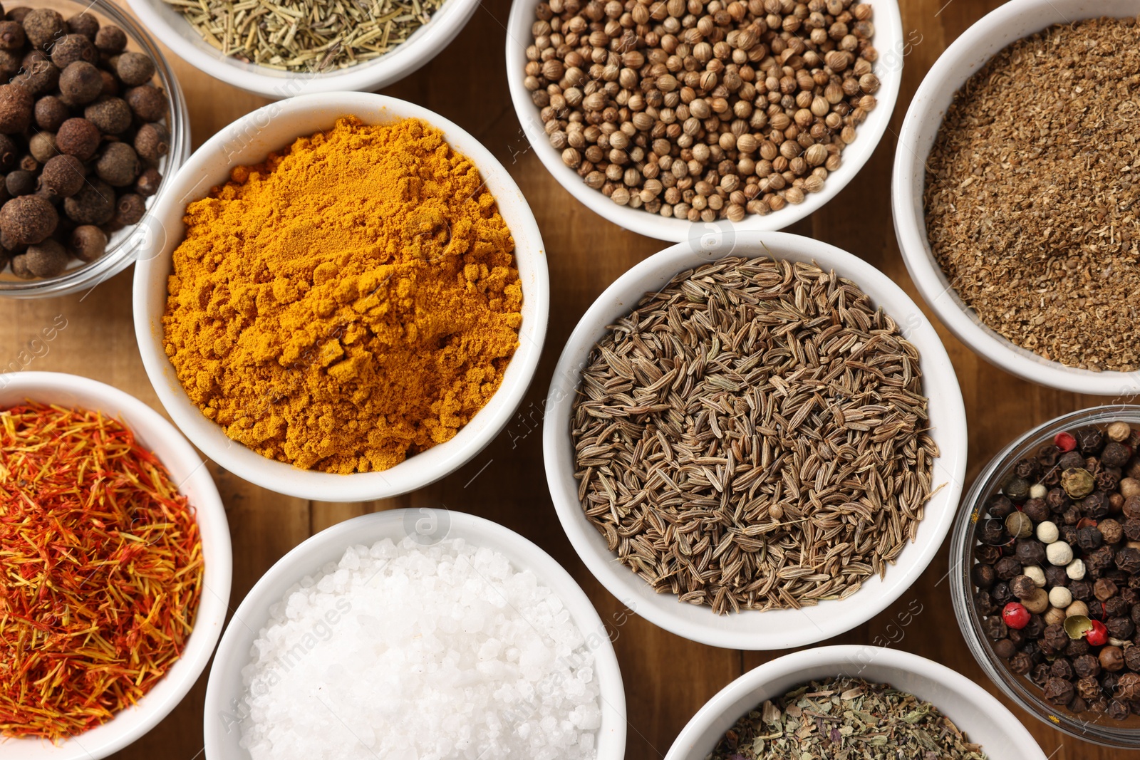 Different aromatic spices on table, flat lay Photo of Different aromatic spices on table, flat lay