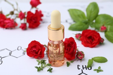 Photo of Bottle of cosmetic product, herbs and red roses on paper with chemical formulas, closeup