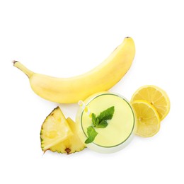 Photo of Superfood. Tasty smoothie in glass and ingredients isolated on white, top view