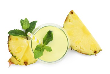 Photo of Superfood. Tasty smoothie in glass and ingredients isolated on white, top view