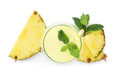 Photo of Superfood. Tasty smoothie in glass and ingredients isolated on white, top view