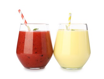 Photo of Superfood. Tasty smoothies in glasses isolated on white