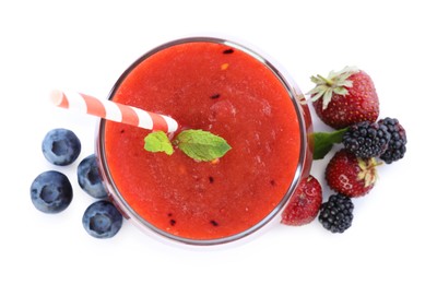 Photo of Superfood. Tasty smoothie in glass and ingredients isolated on white, top view