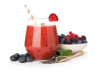 Photo of Superfood. Tasty smoothie in glass and ingredients isolated on white