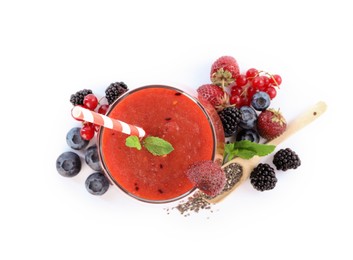 Photo of Superfood. Tasty smoothie in glass and ingredients isolated on white, top view