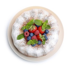 Photo of Tasty Bundt cake with powdered sugar and berries isolated on white, top view
