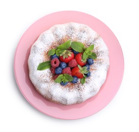 Photo of Tasty Bundt cake with powdered sugar and berries isolated on white, top view