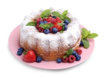 Photo of Tasty Bundt cake with powdered sugar and berries isolated on white