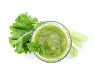 Photo of Superfood. Tasty smoothie in glass and ingredients isolated on white, top view