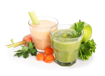 Photo of Superfood. Tasty smoothies in glasses and ingredients isolated on white