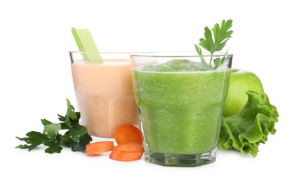 Photo of Superfood. Tasty smoothies in glasses and ingredients isolated on white