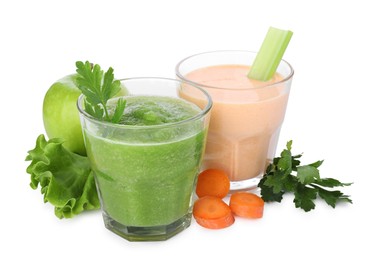 Photo of Superfood. Tasty smoothies in glasses and ingredients isolated on white