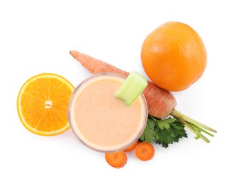 Photo of Superfood. Tasty smoothie in glass and ingredients isolated on white, top view