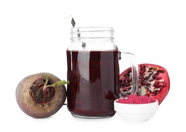 Photo of Superfood. Tasty smoothie and ingredients isolated on white