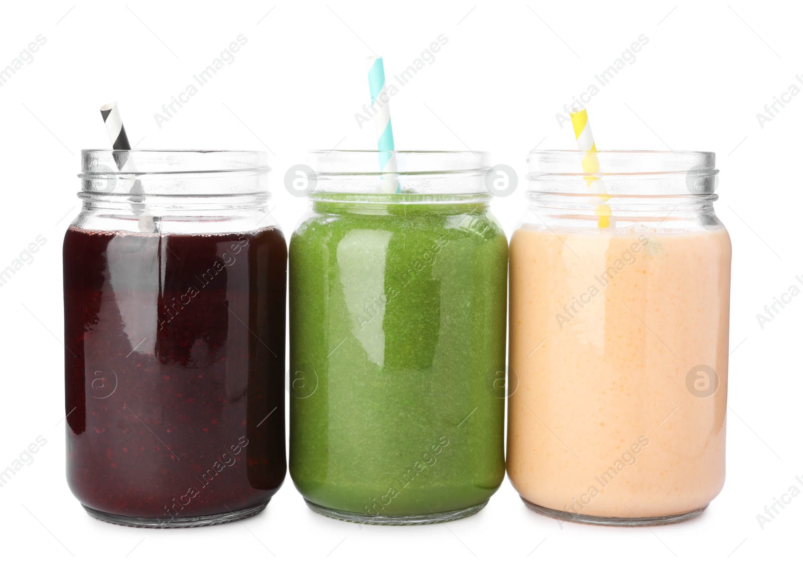 Superfood. Different tasty smoothies in mason jars isolated on white Photo of Superfood. Different tasty smoothies in mason jars isolated on white