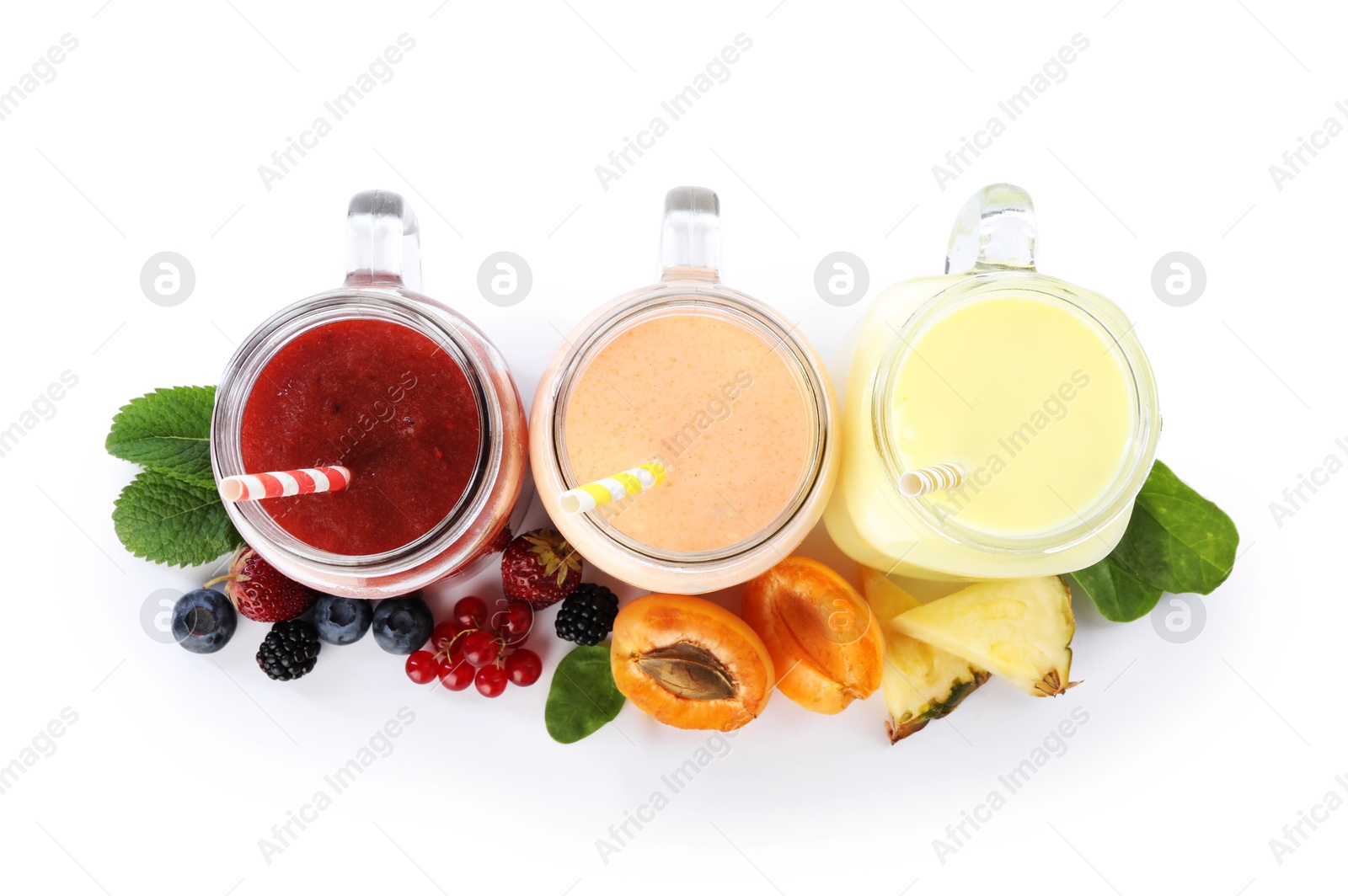 Superfood. Different tasty smoothies in mason jars and ingredients isolated on white, top view Photo of Superfood. Different tasty smoothies in mason jars and ingredients isolated on white, top view