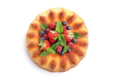 Photo of Tasty Bundt cake with berries isolated on white, top view