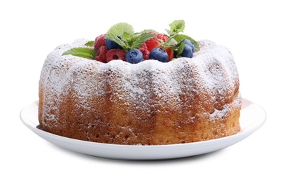 Photo of Tasty Bundt cake with powdered sugar and berries isolated on white