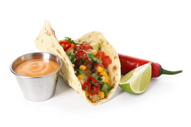 Photo of Tasty vegetarian taco with chickpeas, corn, quinoa and sauce isolated on white
