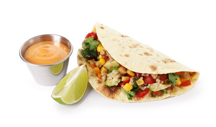 Photo of Tasty vegetarian taco with chickpeas, corn, quinoa and sauce isolated on white