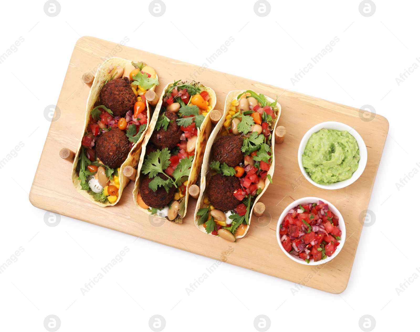 Photo of Tasty vegetarian tacos with falafel, salsa and guacamole isolated on white, top view