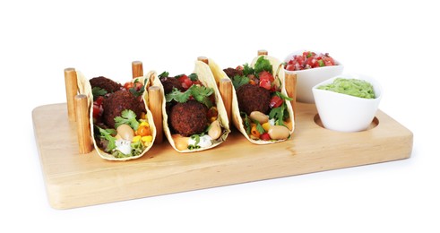 Photo of Tasty vegetarian tacos with falafel, salsa and guacamole isolated on white