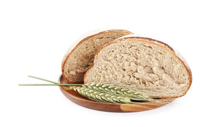 Photo of Pieces of fresh bread and green wheat spikes isolated on white