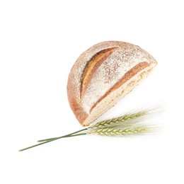 Photo of Piece of fresh bread and green wheat spikes isolated on white, top view