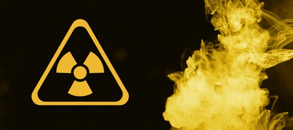 Image of Radioactive sign and yellow toxic smoke against black background. Banner design
