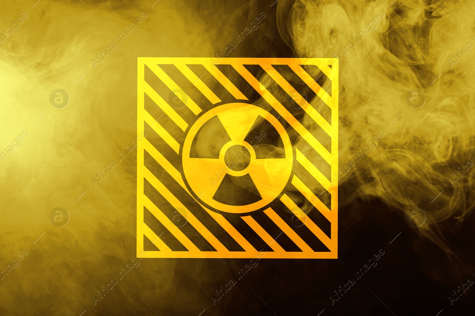 Radioactive sign and yellow toxic smoke against black background Image of Radioactive sign and yellow toxic smoke against black background