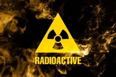 Image of Radioactive sign and yellow toxic smoke against black background