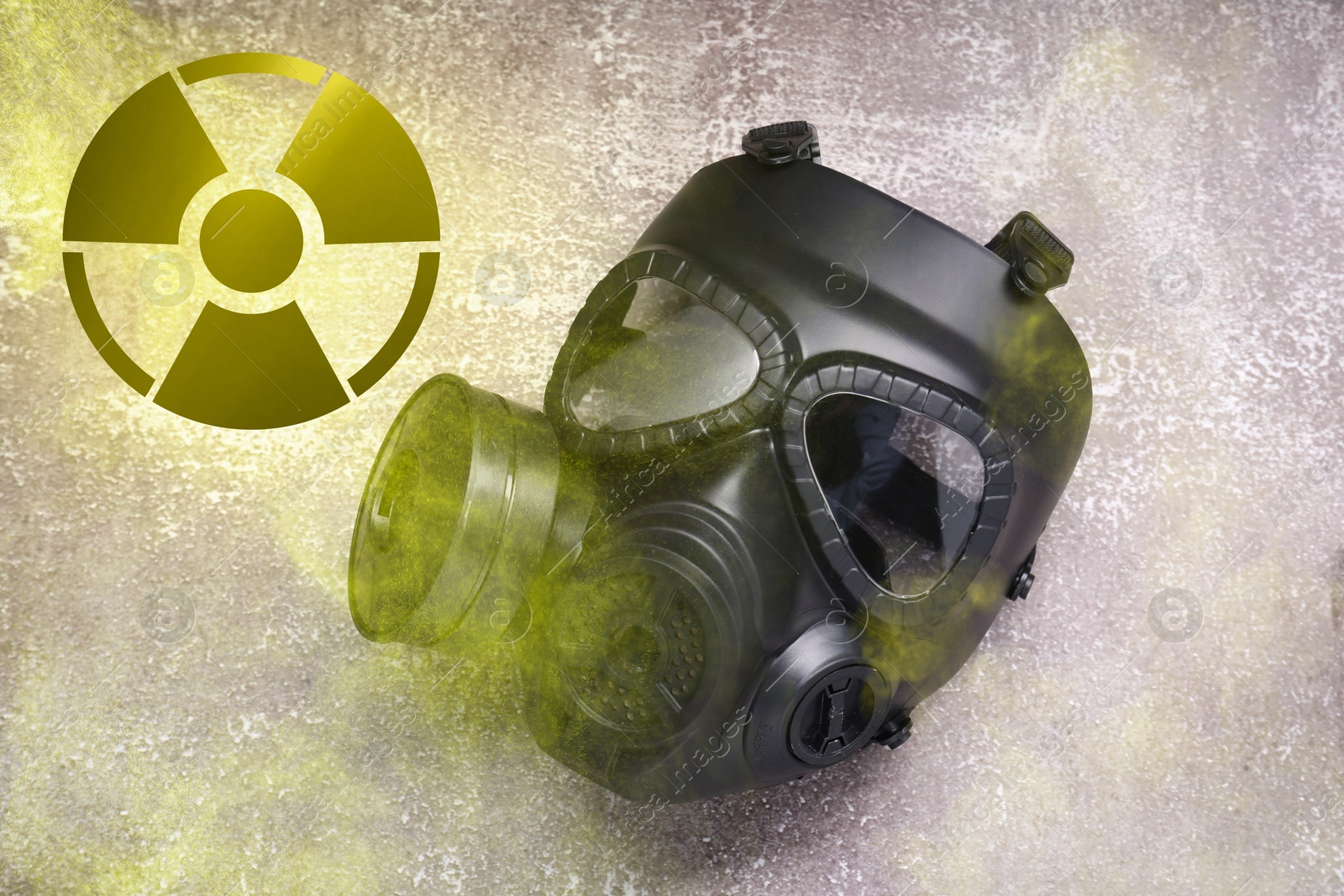 Image of Radiation threat. Gas mask, radioactive sign and smoke on grey background, top view