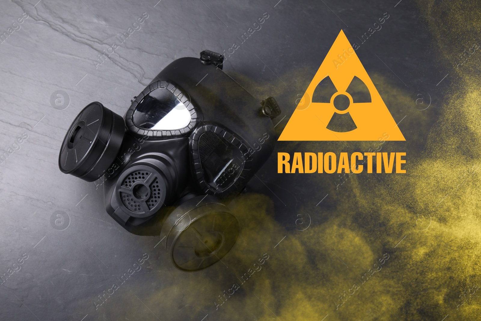 Image of Radiation threat. Gas mask, radioactive sign and smoke on grey background, top view