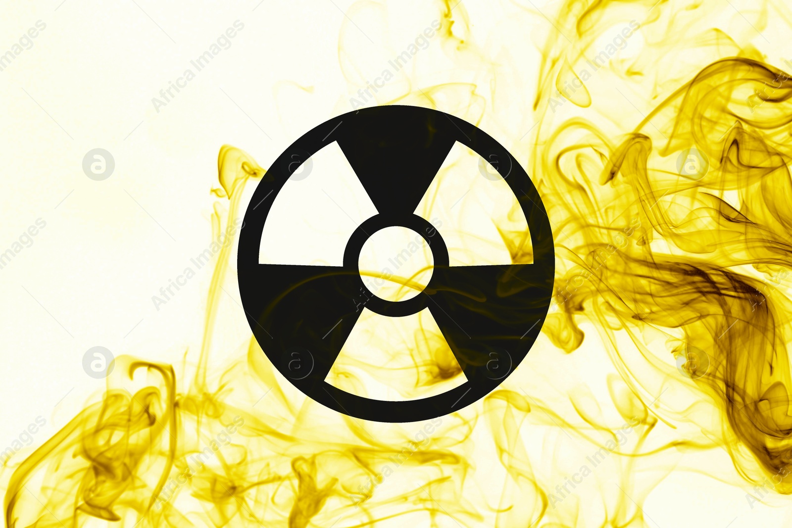 Image of Radioactive sign and yellow toxic smoke against white background